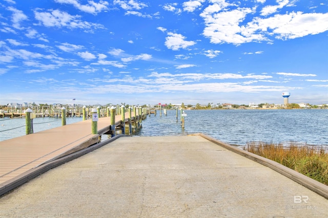 dock area with a water view