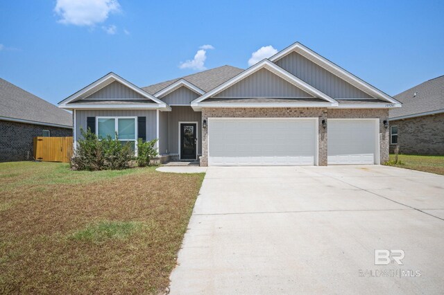 craftsman-style house with a front yard