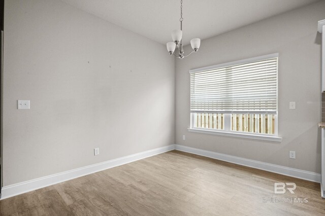 carpeted empty room featuring ceiling fan, a raised ceiling, and crown molding