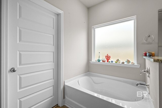 bathroom featuring a shower with shower door, vanity, and wood-type flooring