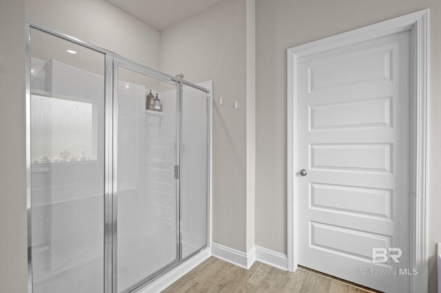 bathroom with vanity and wood-type flooring