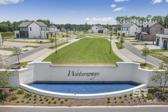841 Inlet Cir, Gulf Shores, AL 36542 - community sign featuring a residential view and a yard