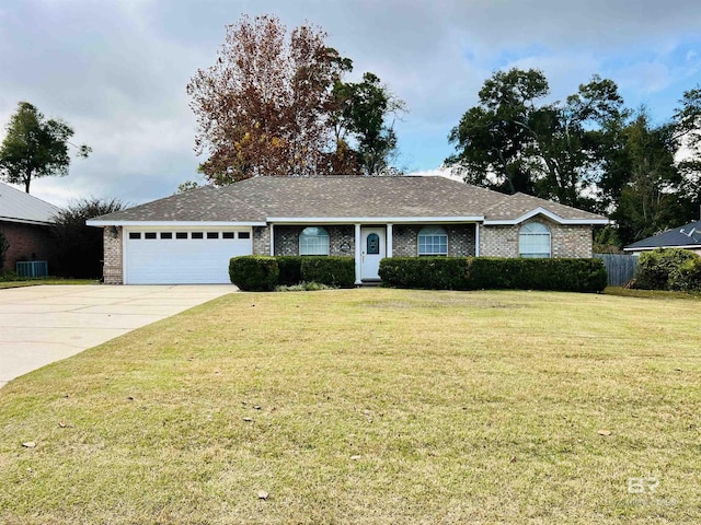 ranch-style home with central AC unit, a garage, and a front lawn