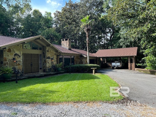 ranch-style house with a front yard