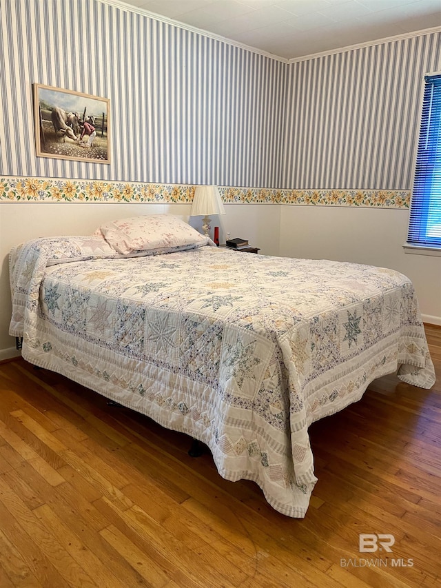 bedroom featuring hardwood / wood-style floors