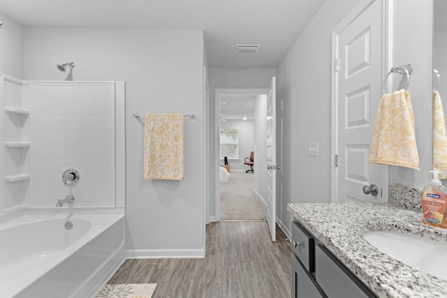 10804 Burlington Way, Mobile, AL 36608 - bathroom featuring vanity, wood finished floors, and  shower combination