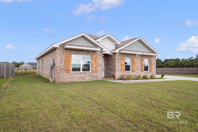 view of front of property with a front lawn