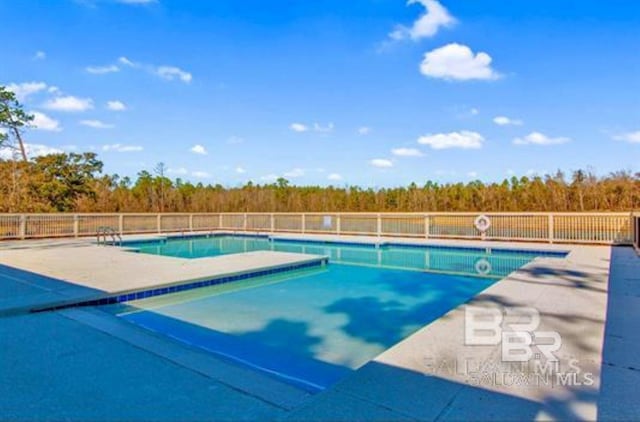 pool featuring fence