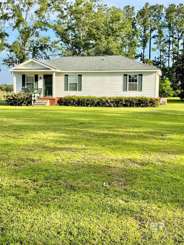 ranch-style home with a front yard