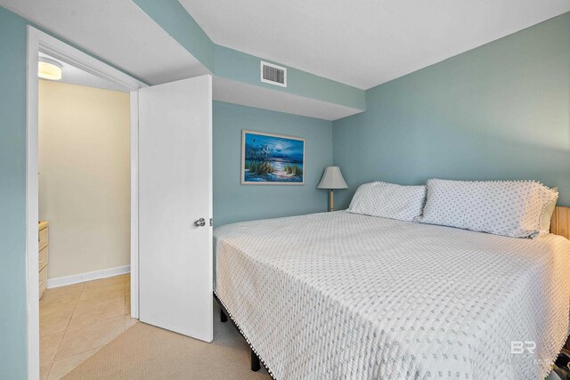 1117 W Beach Blvd Unit 201, Gulf Shores, AL 36542 - bedroom featuring tile patterned flooring and baseboards
