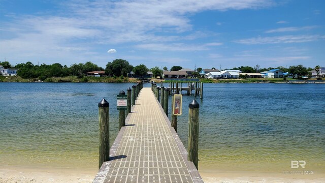 dock area featuring a water view