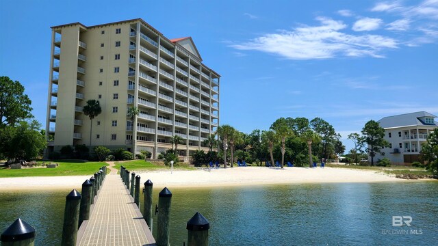 dock area with a water view