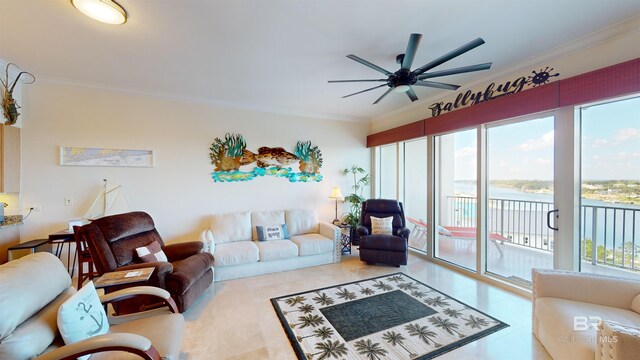 living room featuring a water view, ornamental molding, and ceiling fan