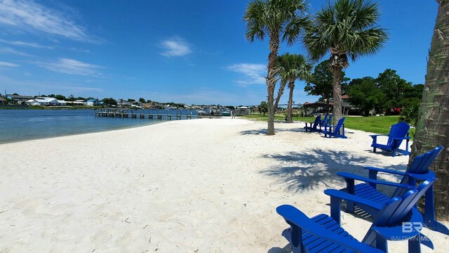 property view of water featuring a beach view