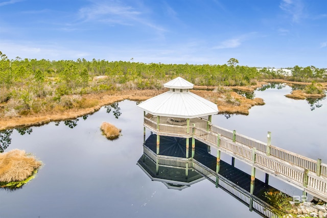 view of dock featuring a water view and a gazebo