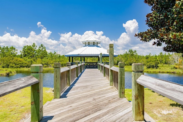 view of dock with a water view and a gazebo