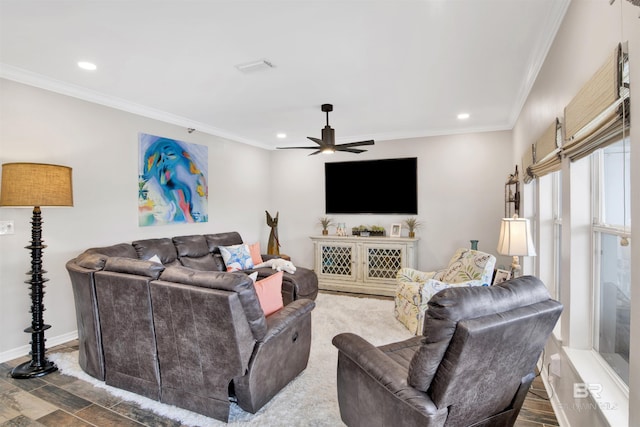 living area with baseboards, ornamental molding, ceiling fan, and recessed lighting