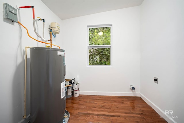 utility room featuring electric water heater