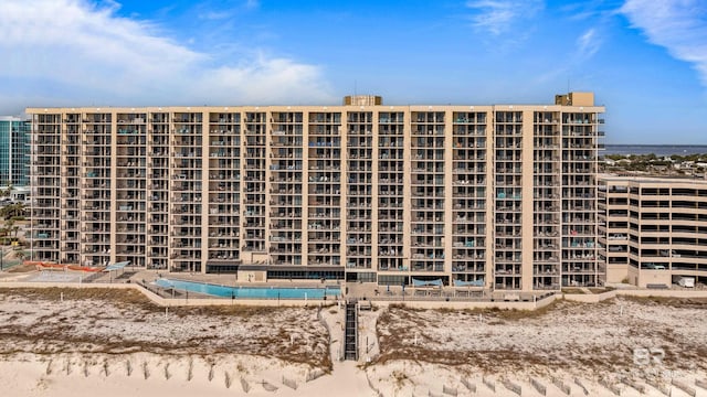 view of building exterior with a water view