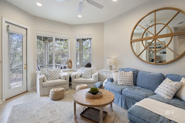 living room with a ceiling fan and recessed lighting