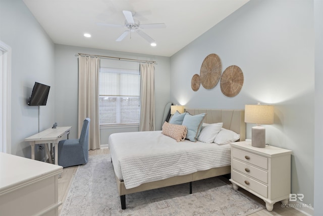 bedroom featuring ceiling fan, light wood-style flooring, and recessed lighting