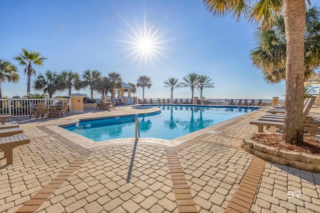 pool featuring a patio area and a gazebo