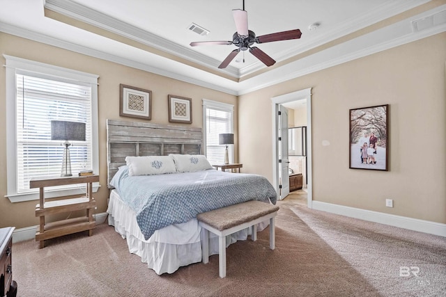 bedroom featuring ensuite bathroom, ceiling fan, light colored carpet, and crown molding