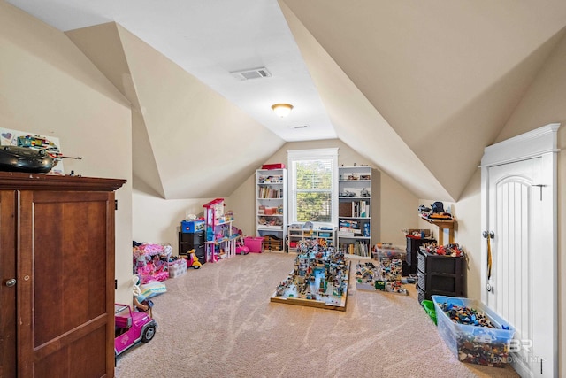 playroom with carpet and lofted ceiling