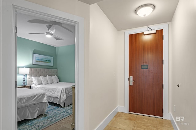 foyer with ceiling fan