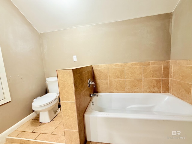 2371 Carriage Dr, Mobile, AL 36693 - bathroom featuring a garden tub, lofted ceiling, pet washing station, and tile patterned floors