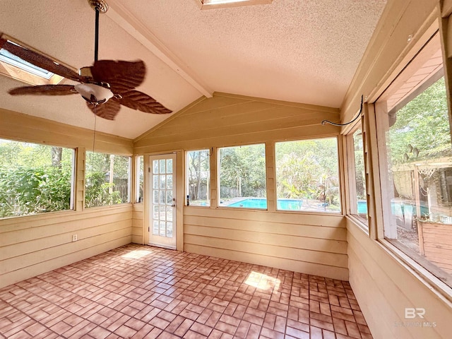 2371 Carriage Dr, Mobile, AL 36693 - unfurnished sunroom with wooden walls, brick patterned flooring, and a textured ceiling