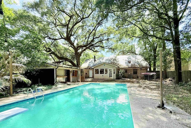 2371 Carriage Dr, Mobile, AL 36693 - swimming pool featuring a diving board