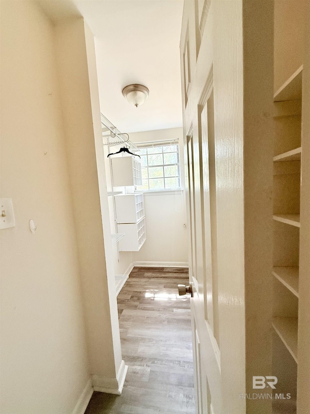 2371 Carriage Dr, Mobile, AL 36693 - corridor featuring wood finished floors and baseboards