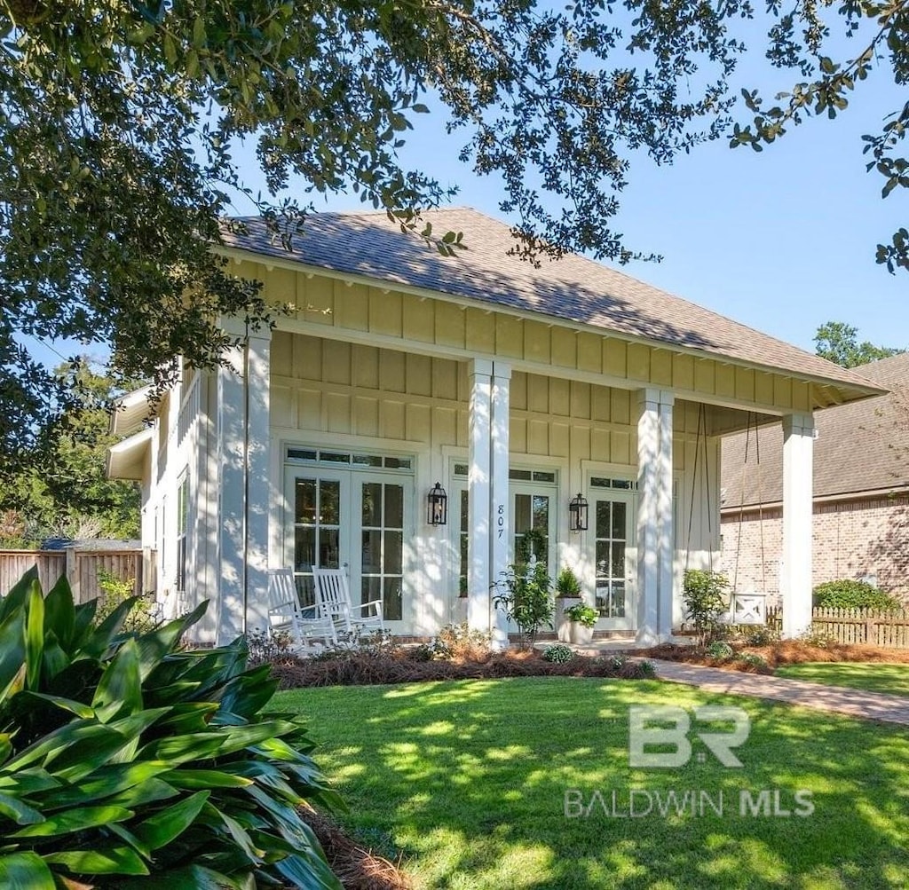 807 Coleman Ave, Fairhope, AL 36532 - rear view of property with roof with shingles and board and batten siding