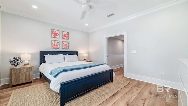 167 E J Cir, Gulf Shores, AL 36542 - bedroom featuring crown molding, baseboards, light wood-style flooring, recessed lighting, and ceiling fan