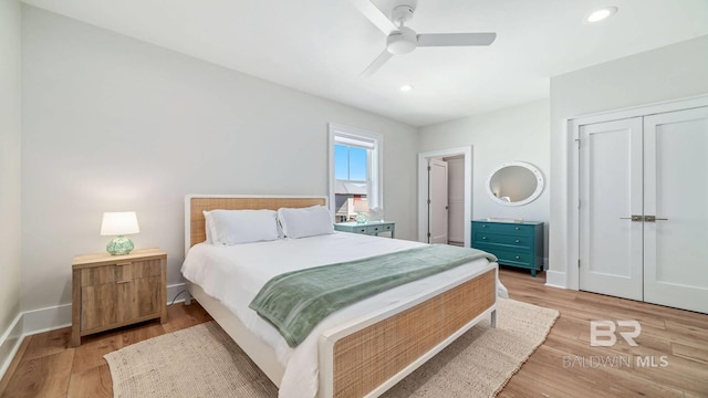 167 E J Cir, Gulf Shores, AL 36542 - bedroom featuring light wood-type flooring, recessed lighting, ceiling fan, baseboards, and a closet