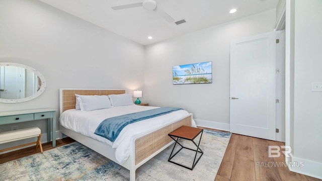 167 E J Cir, Gulf Shores, AL 36542 - bedroom featuring wood finished floors, recessed lighting, a ceiling fan, and baseboards