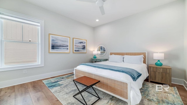 167 E J Cir, Gulf Shores, AL 36542 - bedroom with baseboards, wood finished floors, a ceiling fan, and recessed lighting