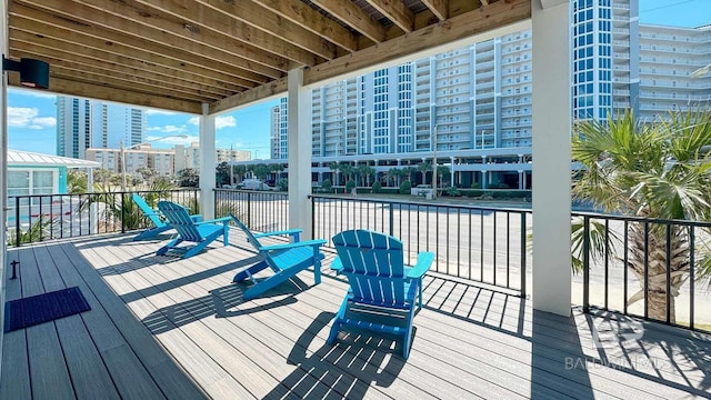 167 E J Cir, Gulf Shores, AL 36542 - wooden terrace with a city view