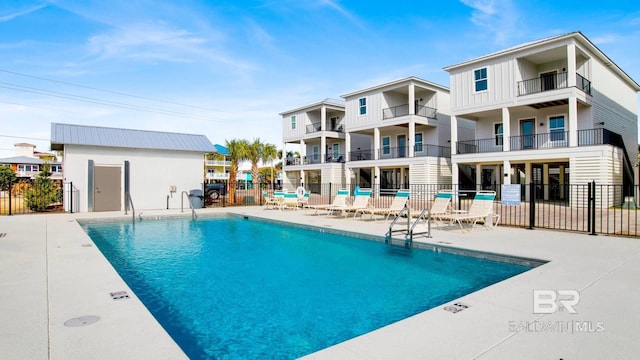 167 E J Cir, Gulf Shores, AL 36542 - community pool with fence and a patio