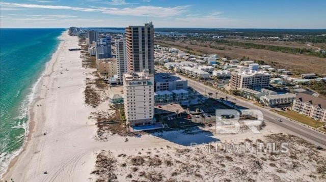 bird's eye view with a view of the beach and a water view