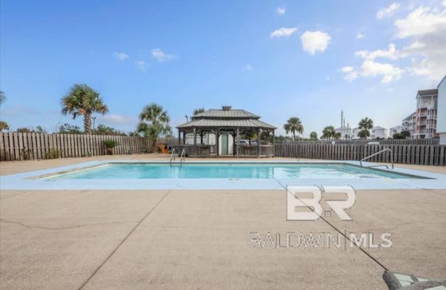 view of pool with a gazebo and a patio area