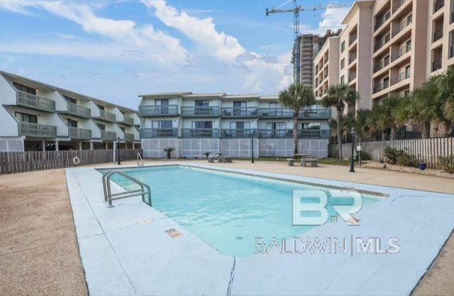 view of pool with a patio area