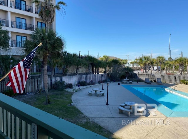 view of pool featuring a patio area