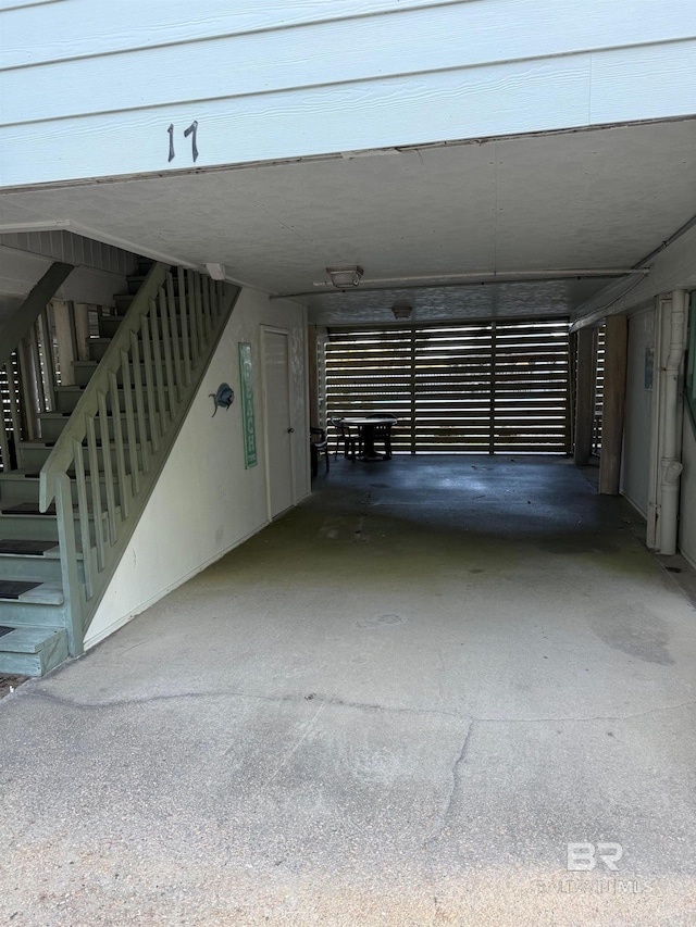 garage with a carport