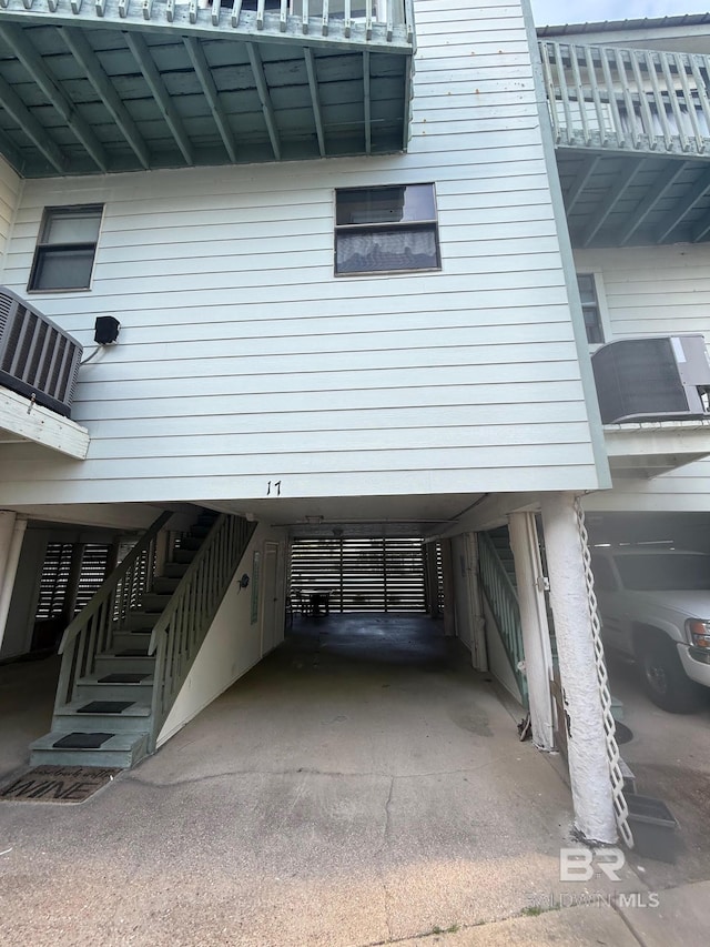 view of home's exterior featuring a carport