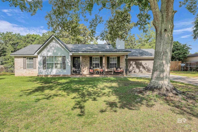 23214 Rochelle Loop, Robertsdale, AL 36567 - ranch-style home featuring a garage, a porch, a chimney, concrete driveway, and brick siding