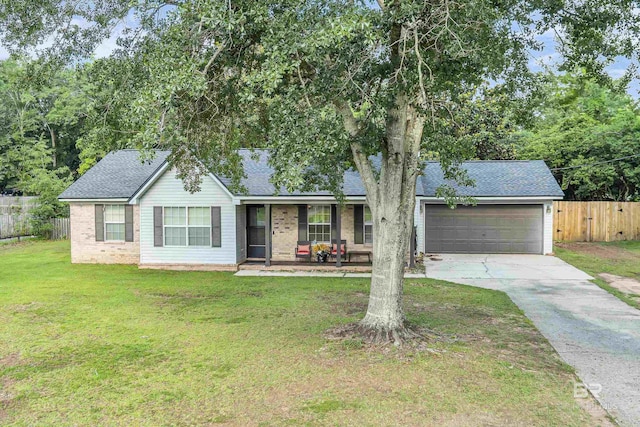 23214 Rochelle Loop, Robertsdale, AL 36567 - ranch-style house with covered porch, driveway, an attached garage, roof with shingles, and brick siding