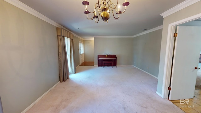 unfurnished room with an inviting chandelier, baseboards, crown molding, and light colored carpet