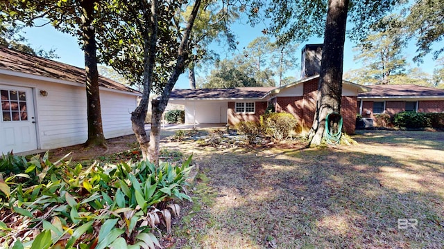 exterior space with brick siding